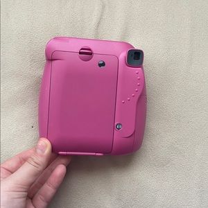 Pink polaroid camera